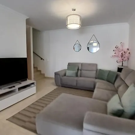 Sunny Duplex With Pool In By Lovelystay