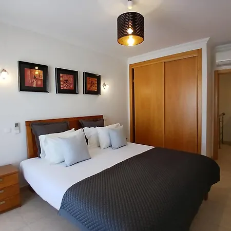 Sunny Duplex With Pool In By Lovelystay