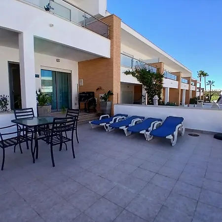 Sunny Duplex With Pool In By Lovelystay البوفيرا